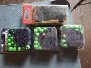 lot 40 image: 3 Packages of 25 Ball Straps and a Cargo Net