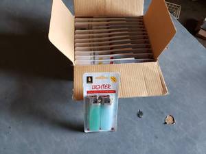 lot 46 image: Box of 24 Packages of Lighters, 48 Total LIghters