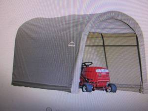 lot 75 image: ShelterLogic 10 x 10 x 8 Round Top Storage Shed open box.