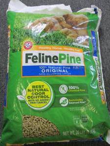 lot 209 image: 20 pounds of feline pine  cat litte...