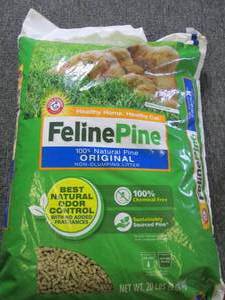 lot 210 image: 20 pounds of feline pine cat litter...