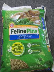 lot 212 image: 20 pounds of feline pine cat litter...