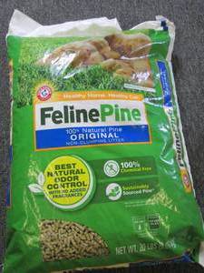 lot 213 image: 20 pounds of feline pine cat litter...