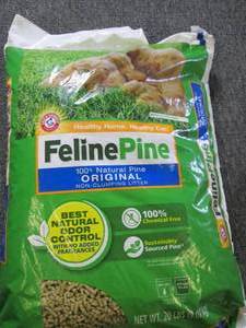 lot 214 image: 20 pounds of feline pine cat litter...