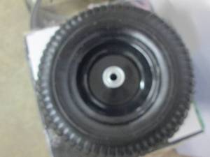 lot 219 image: Wheel barrow tire and rim ...