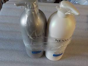2 Nexxus Bottles Shampoo and Condit...