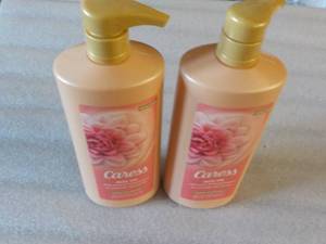 2 Caress Floral Oil Essense...