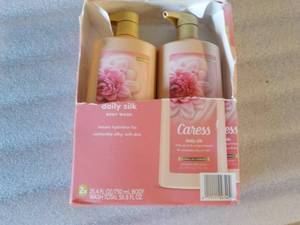 2 Caress Floral Oil Essense...