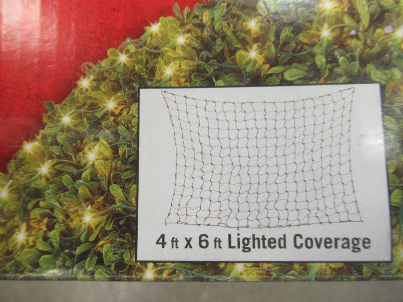 lot 153 image: (2) Boxes of 300 Incandescent Mini Lights Net 48 x 72 - SOLD AS IS