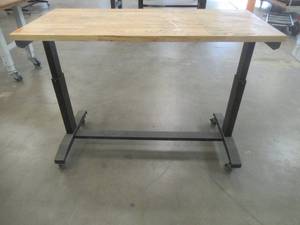 lot 33 image: Husky Height Adjustable Workbench, 52W x 24D, Missing Height Adjustable crank Handle. Used in Warehouse - SOLD AS IS