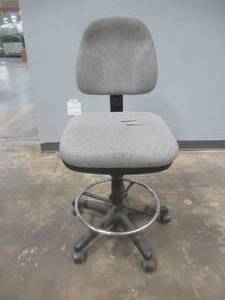 lot 63 image: Office Chair on casters with adjustable Height - Some Staining on Upholstery, Used in Warehouse, SOLD AS IS.