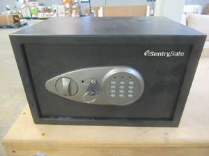 lot 96 image: Sentry Safe with Key, Digital code unknown, Lock must be broken (Will not open), 14 x 10 x 9 Tall. Used in Retail Store, SOLD AS IS
