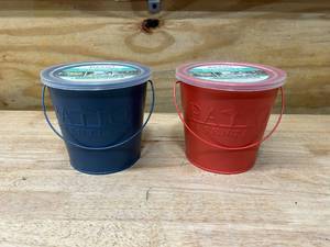 lot 75 image: PATION ESSENTIALS Lot of 2- Citronella Candles in Decorative Bucket
