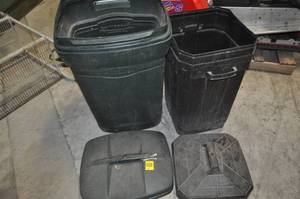 Two Rubbermaid Rolling Garbage Cans