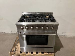 lot 1 image: Thor Kitchen  36 in. 5.2 cu. ft. 6 Burner Slide-in Dual Fuel Range with Gas Stove and Electric Oven in Stainless Steel