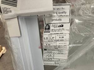 lot 74 image: LOT of 4. 30 58 in. x 52 34 in. 70 Pro Series Low-E Argon Glass Double Hung White Vinyl Replacement Window, Screen Incl