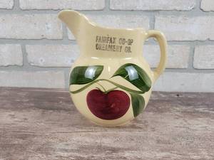 lot 192 image: Vintage WATT Pottery Pitcher Fairfax CO-OP Creamery Co - Approx. 7 Tall
