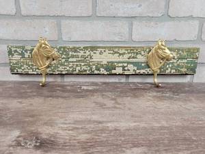 lot 212 image: Cast Iron Horse Coat Hooks on Antique Chipped Paint Board - Approx. 21.5 Long