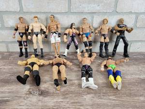 (11) Mattel  JAKKS Wrestling Action Figures - Dated 1999 to 2014- Average about 6.5 Tall Each