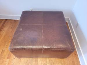 lot 26 image: Distressed Brown Leather Ottoman