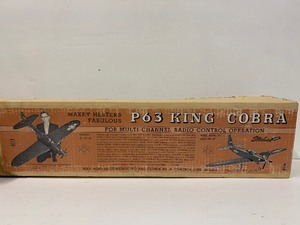 lot 17 image: LARGE Vintage Sterling Maxey Hesters Fabulous P63 KING COBRA Balsa Wood RC Model Airplane Kit