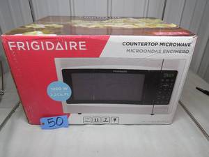 lot 50 image: Frigidaire - 2.2 Cu. Ft. Mid-Size Microwave - Stainless steel Model FFCE2278LS Unused