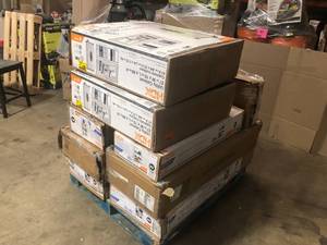 lot 5 image: Pallet with assorted shelving units and cabinets various models and conditions customer returns  see pictures