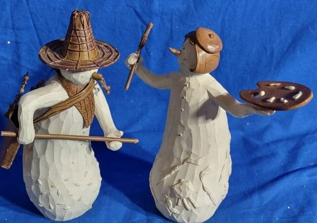 lot 15 image: Flurryville Collection by Living Quarters Uncle Celsius and Aunt Arctica Christmas Decorations (Open Box Item)