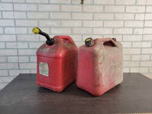lot 451 image: (2) 5 Gallon Poly Gas Cans - NO SHIPPING
