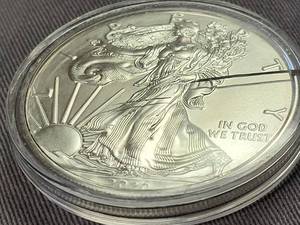 2020 AMERICAN SILVER EAGLE IN AIRTITE (scratch on airtite not coin)