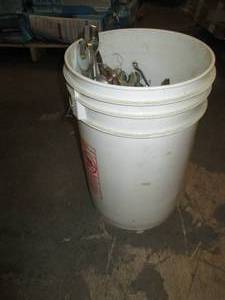 Bucket of wrenches and sockets ...