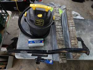 lot 17 image: Stanley 3 Hp 5 Gallon Shop Vacuum, Saw Horses, Car Hitch, Power Inverter