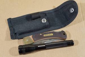 lot 25 image: Schrade Old Timer Pocket Knife with Flashlight in Sheath - NAPA
