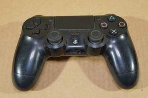 lot 28 image: PS4 Controller -Black