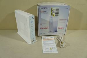 lot 58 image: Arris Surf Board Internet, Wi-Fi, and Voice Modem