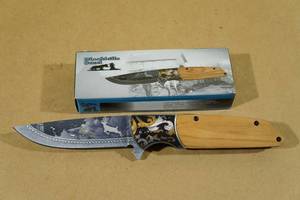 lot 91 image: Blackhills Steel Etched Folding Pocket Knife