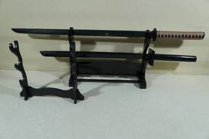lot 110 image: Sword Racks with 2 Wood Swords