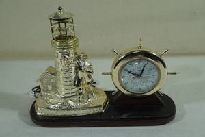 lot 153 image: United Clock Co Light House Clock with Keeper -Need Repair
