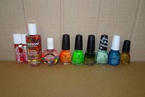 lot 231 image: 6 China Glaze Nail Polish with Cuticle Oil, Nail Polish Remover, Lip Gloss