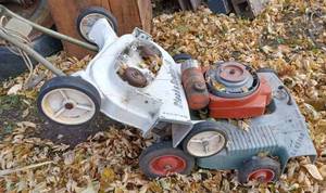 Two Vintage Lawn Mowers - an Early Lawn Boy Walk Behind and a Black & Decker Missing Motor and Parts