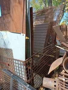36-inch X 46-inch X 30-inch deep Palletainer Full of Four 24-inch X 78-inch Iron Grates, Sheet Metal and