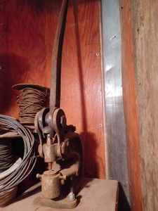 Vintage Cast Iron Riveter Mounted on a 2 X 10 Board