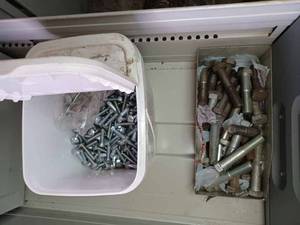 4-Drawer File Cabinet Containing New 4-inch Course and Fine Threaded Bolts, One 10-inch Course Threaded Bolt,