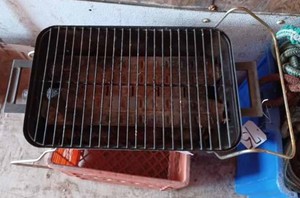 Working Table-Top Char-Broil Gas Grill and a Plastic Milk Crate
