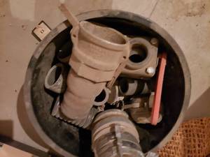 Pail of Banjo and Other Pipe Fittings