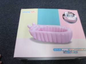 lot 20 image: Inflatable Pink Bathtub...
