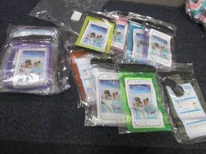 lot 39 image: 2- 8ks Waterproof Phone Pouches...