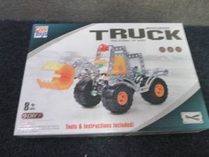 lot 57 image: Totally Cool Toys Intelligient Truc...