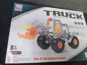 lot 58 image: Totally Cool Toys Intelligient Truc...