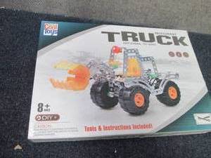 lot 59 image: Totally Cool Toys Intelligient Truc...